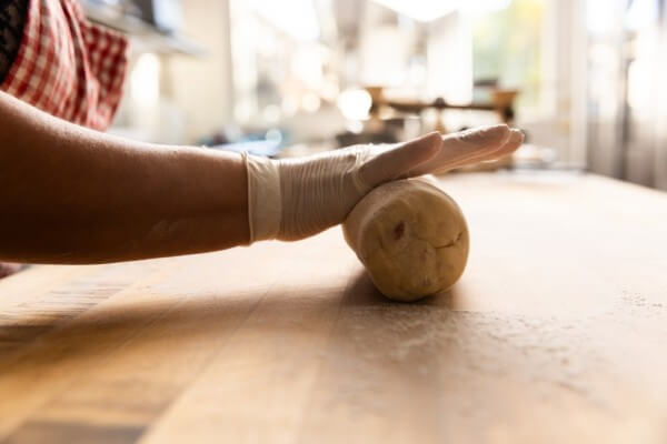Hand rolling biscotti logs