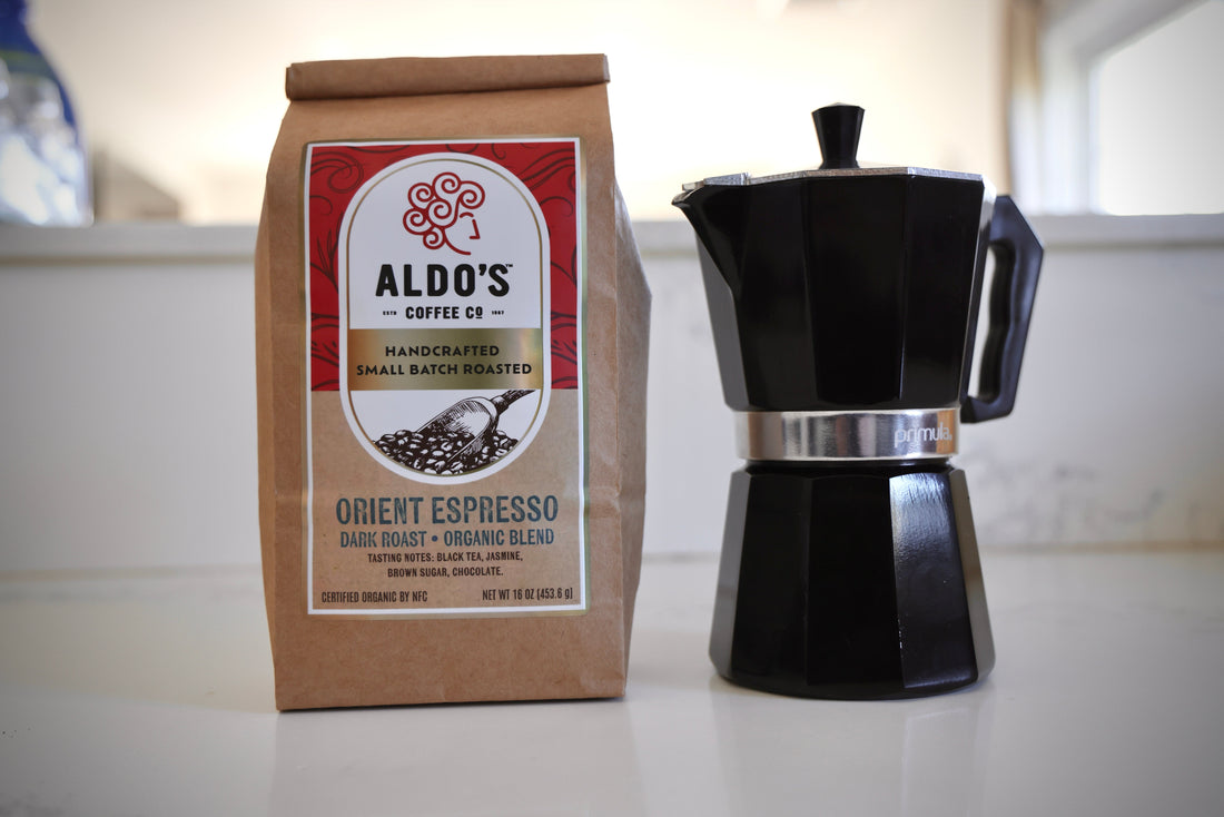 Moka pot with freshly roasted coffee ready for brewing