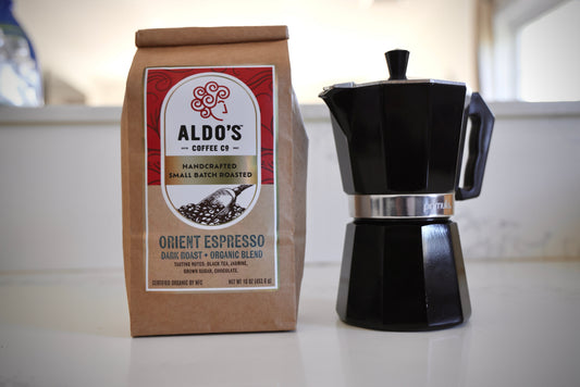 Moka pot with freshly roasted coffee ready for brewing